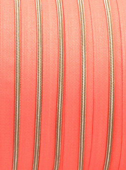 Endlosreißverschluss metallisiert schmal koralle/messing-antik (1m)